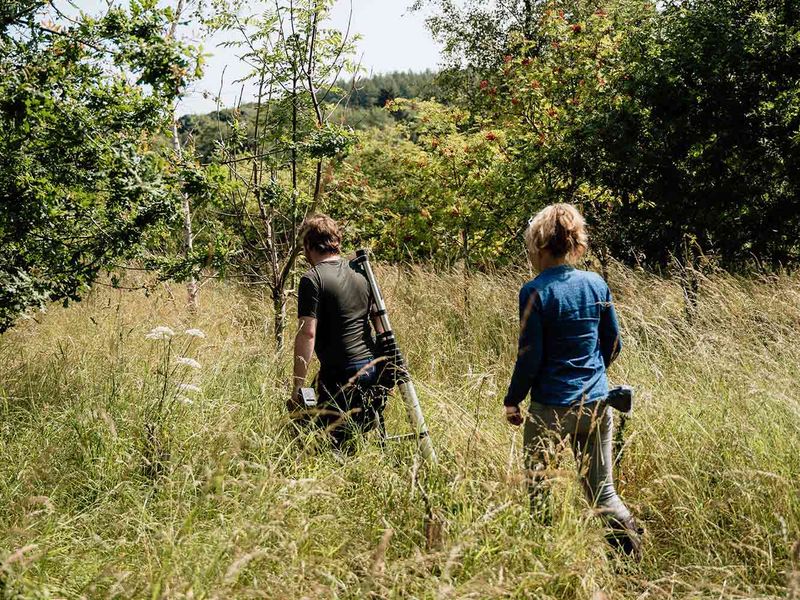 Fieldwork - walking through the tall grasses of Waterside Farm