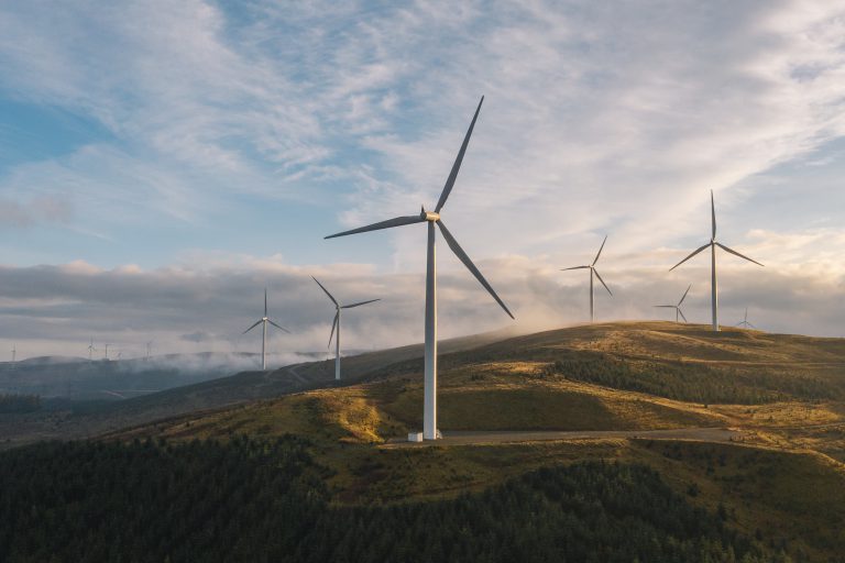 Wind turbines on green hills